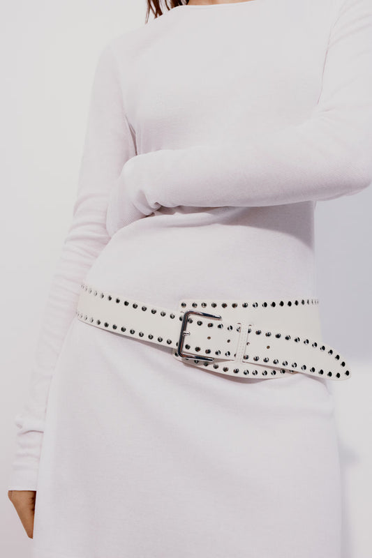 Studded asymmetric belt